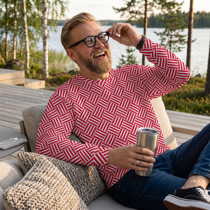 Good Wishes 365 unisex sweatshirt with red and white basketweave print worn by a man sitting outdoors by a lake