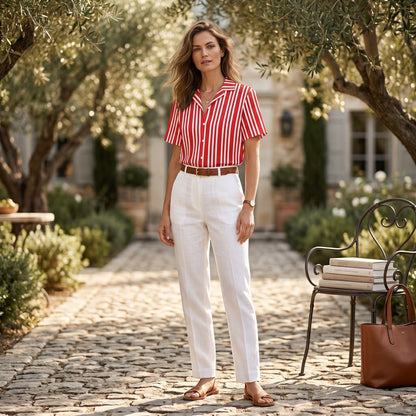 Good Wishes 365  all-over print red and white candy-striped short-sleeve button-down shirt with a camp collar worn by a woman, UPF50+, sun protection.