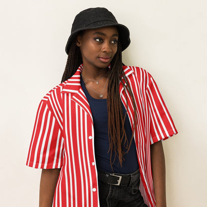 Good Wishes 365 red and white candy-striped short-sleeve button-down shirt worn open over a navy tank top