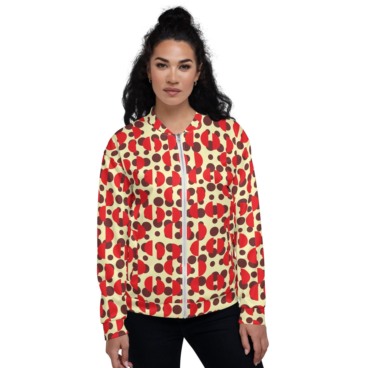 Good Wishes 365 retro bomber jacket with brown polka dots and red semi-circles on a cream background worn by a model