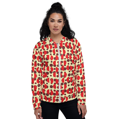 Good Wishes 365 retro bomber jacket with brown polka dots and red semi-circles on a cream background worn by a model