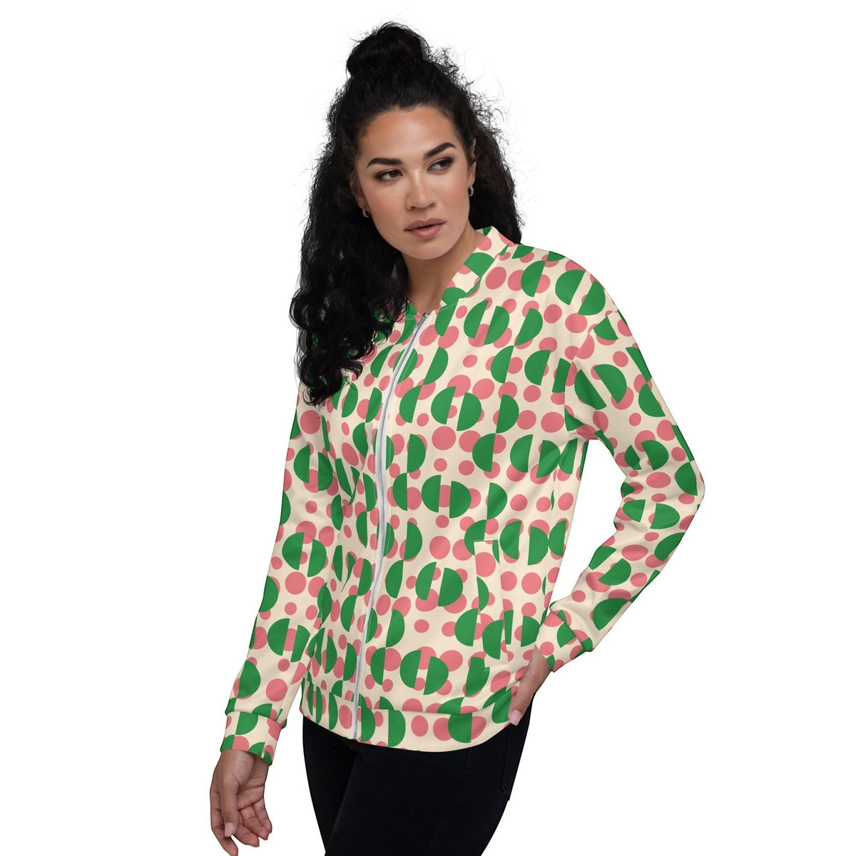 Good Wishes 365 unisex bomber jacket with a cream background, pink polka dots, and green semi-circles print.
