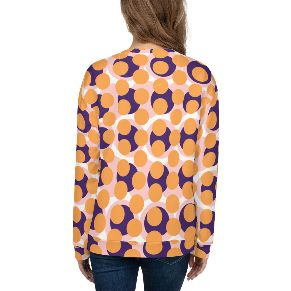 Good Wishes 365 women's recycled sweatshirt featuring a 70s pop art geometric circle pattern in orange and purple.