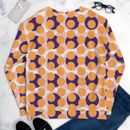 Good Wishes 365 recycled sweatshirt featuring a 70s pop art geometric circle pattern in orange, purple, and pink.