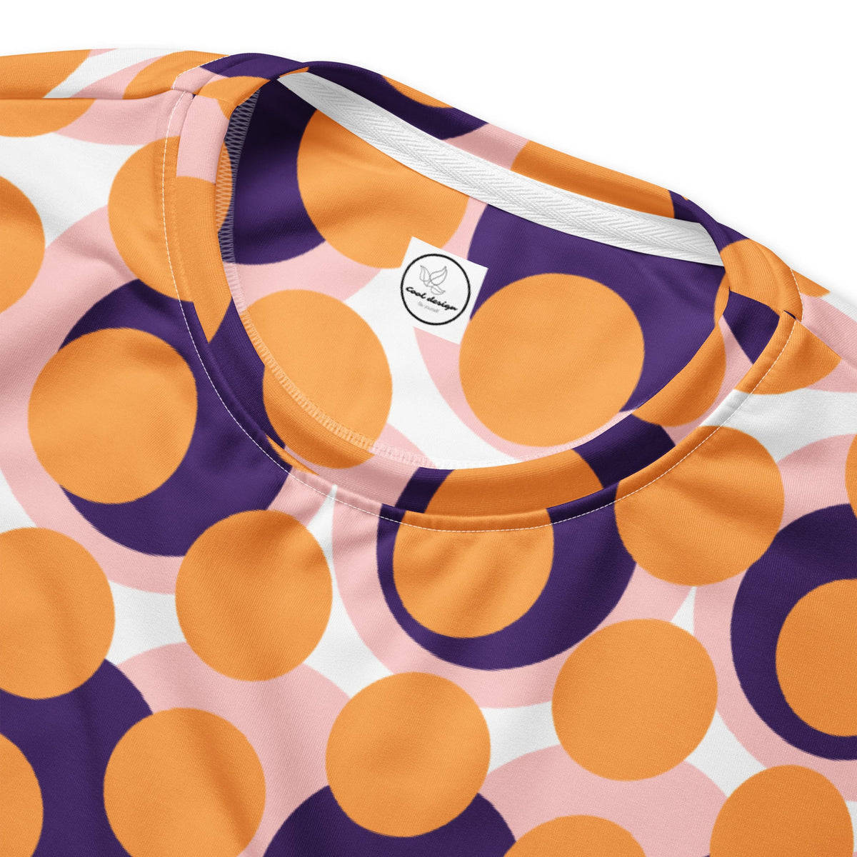 Good Wishes 365 recycled sweatshirt featuring a retro 70s pop art geometric circle pattern in orange, purple, and pink.