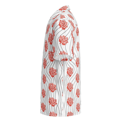 Good Wishes 365 unisex button up shirt with red rose floral print and wavy lines on a white background, side view.