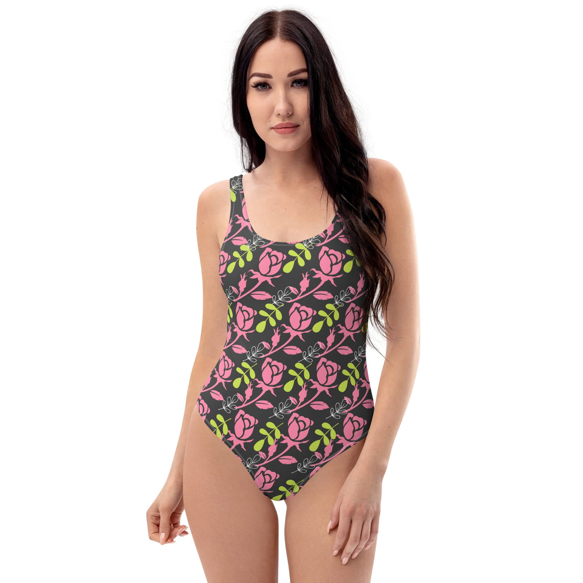 Good Wishes 365 one-piece swimsuit featuring a dark background with a vibrant pink rose and green leaf floral print.