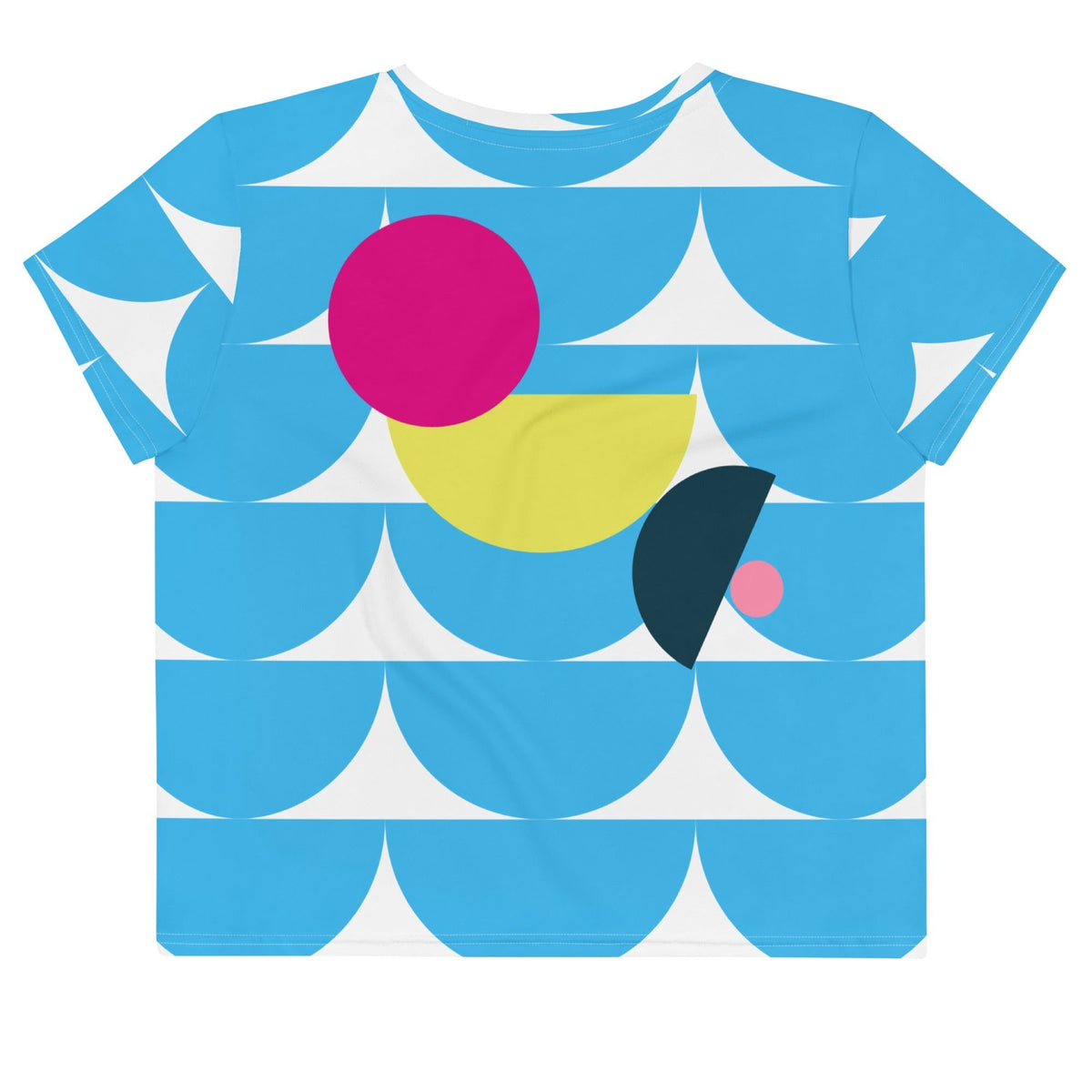 Good Wishes 365 sky blue crop tee with abstract geometric mushroom pattern in pink and yellow on a white background.