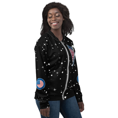 Good Wishes 365 unisex bomber jacket with black space print, stars, and American flag patches on a smiling model.