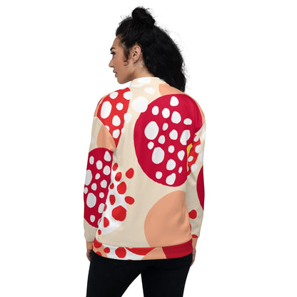 Good Wishes 365 unisex bomber jacket with a red, peach, and yellow strawberry print, back view on a woman.
