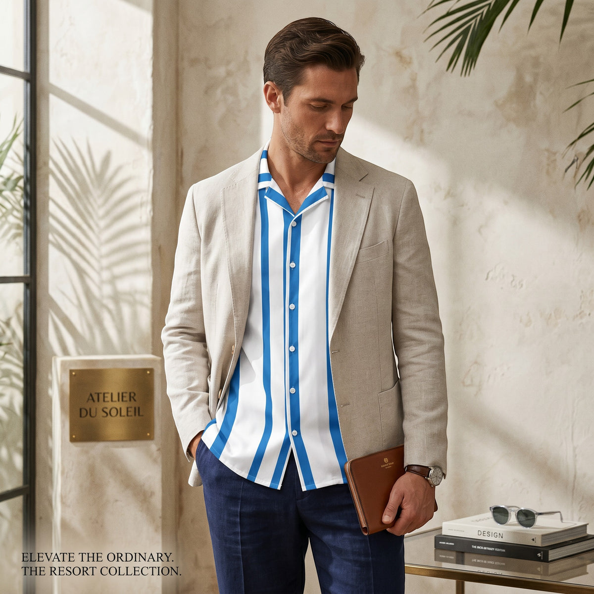 Good Wishes 365 men's white and blue vertical striped short sleeve button shirt worn under a beige blazer.