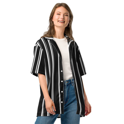 Good Wishes 365 black and white vertical striped short sleeve button-up shirt worn open over a white t-shirt and jeans.