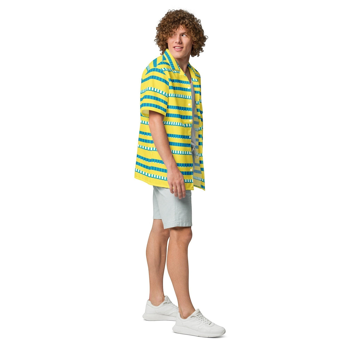 Good Wishes 365 model wearing a vibrant yellow and blue striped short sleeve button-up shirt with a camp collar