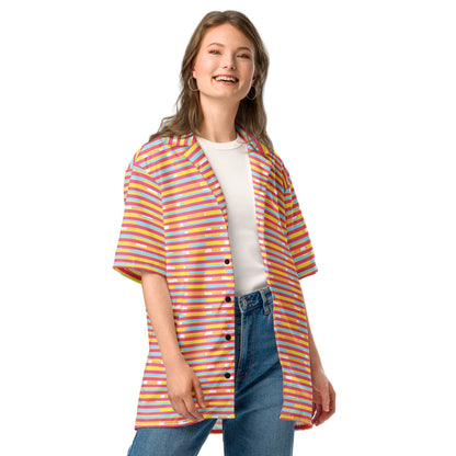 Good Wishes 365 multicolor striped short sleeve button-up shirt worn by a smiling woman with jeans and white tee.