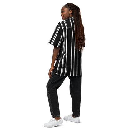 Good Wishes 365 black and white vertical striped short sleeve button-up shirt worn by a woman with braided hair.