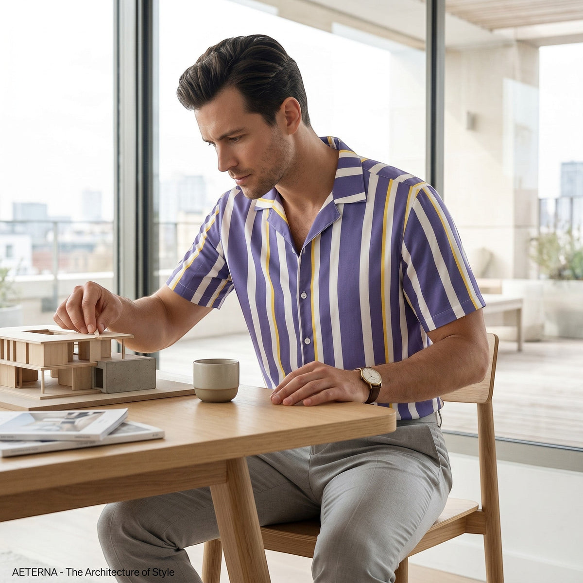 Good Wishes 365 men's periwinkle, white, and yellow vertical striped short sleeve camp collar shirt on a man.