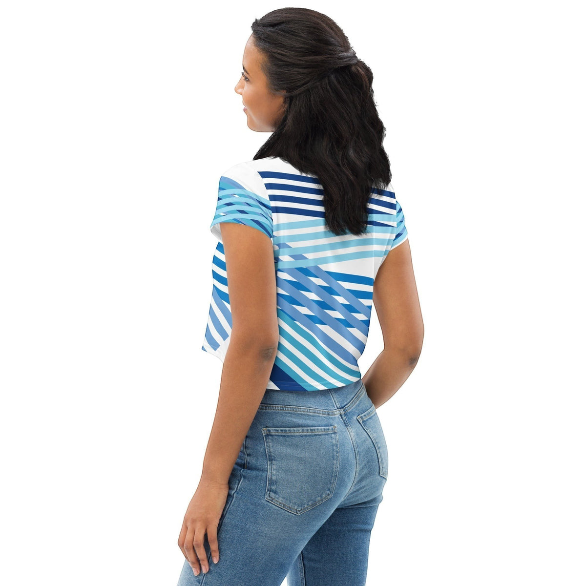 Good Wishes 365 blue and white geometric striped short sleeve crop tee worn by a woman with jeans, back view