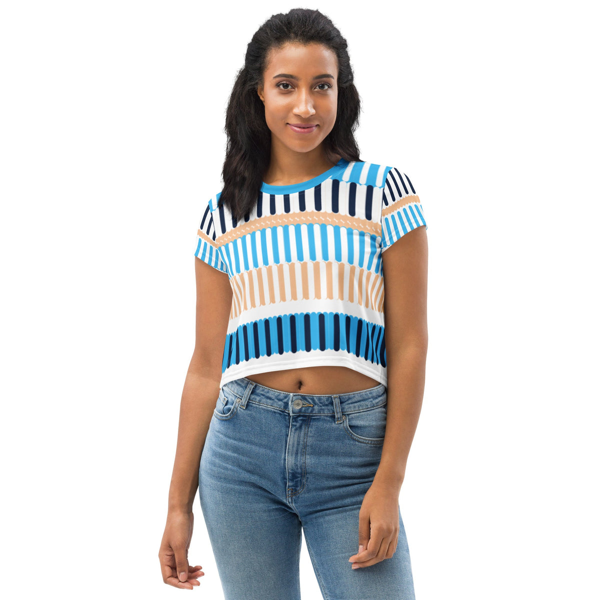Model wearing a Good Wishes 365 crop tee with a blue, navy, and sand vertical stripe coastal print and crew neck.