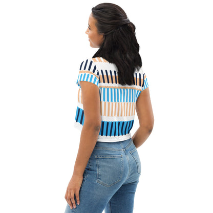 Good Wishes 365 crop tee with blue, navy, and sand vertical stripe print worn by a woman from the back view