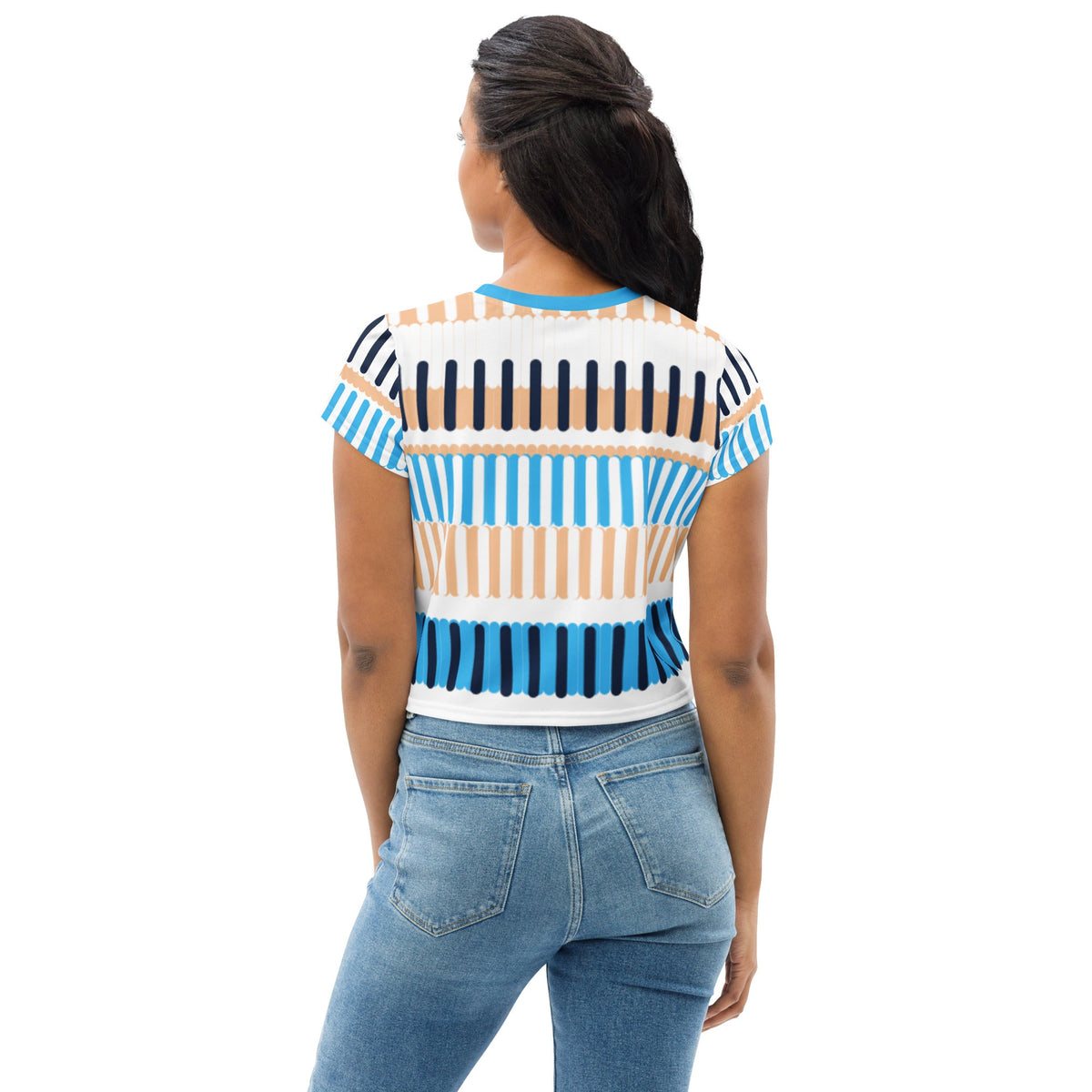 Good Wishes 365 crop tee with blue, navy, and sand vertical stripe print worn by a woman with jeans, back view