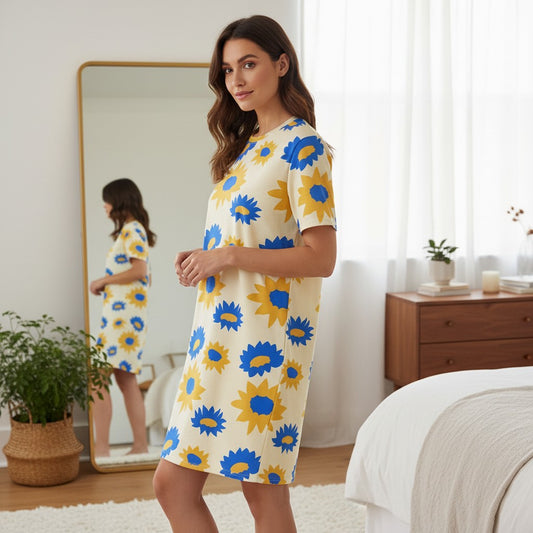 Good Wishes 365 All-Over Print T-Shirt Dress in Sunburst Bloom pattern with yellow and blue flowers on a cream background.