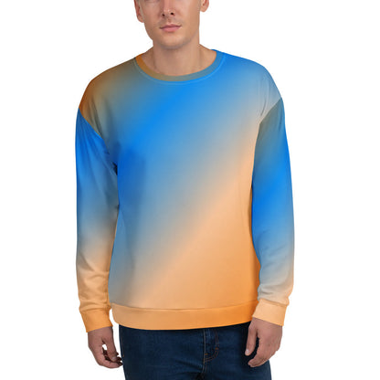 Good Wishes 365 unisex crew neck sweatshirt with a vibrant blue and orange sunset gradient print on a male model.