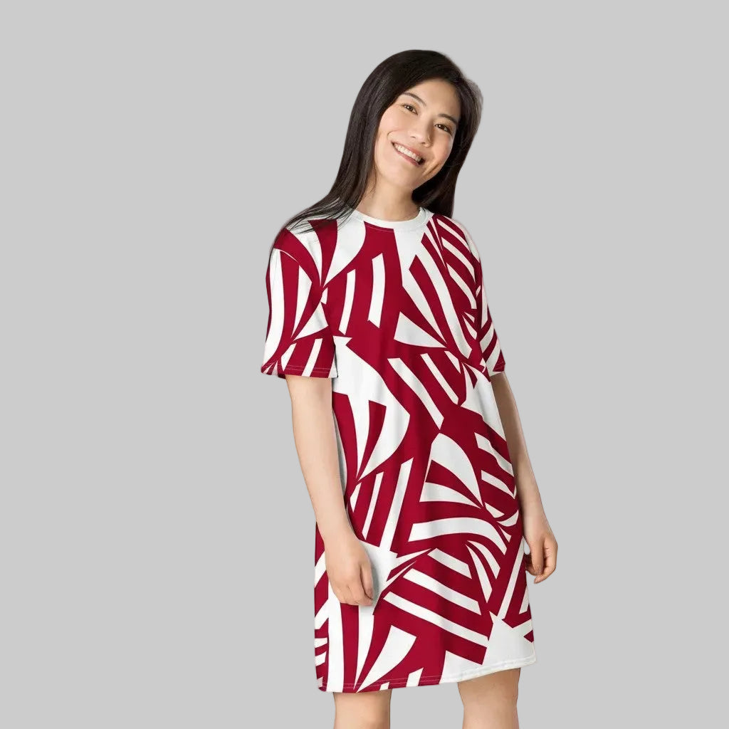 Good Wishes 365 All-Over Print T-shirt Dress in Bold Rhythm Carmine. Red and white abstract pattern, polyester-spandex blend, oversize fit, above-the-knee length.