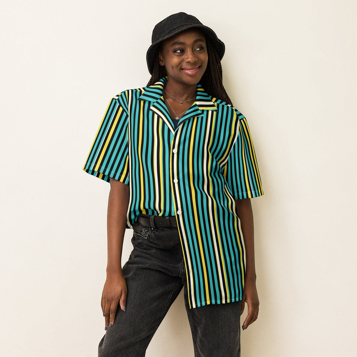 Good Wishes 365 teal striped short sleeve button-up shirt with UPF50+ protection worn by a woman in a bucket hat.