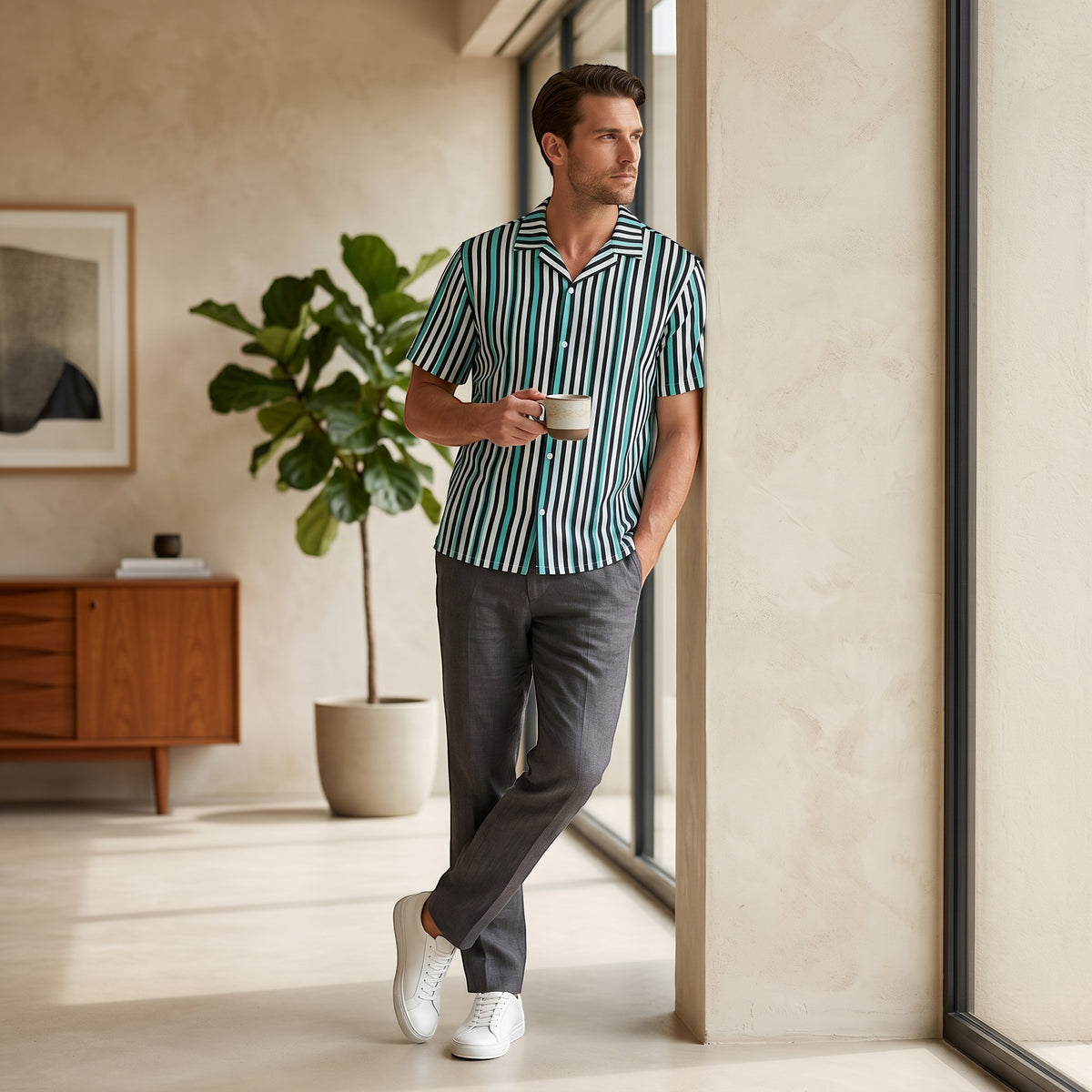 Good Wishes 365 men's teal, black, and white vertical striped short sleeve shirt with a camp collar and UPF50+ fabric.