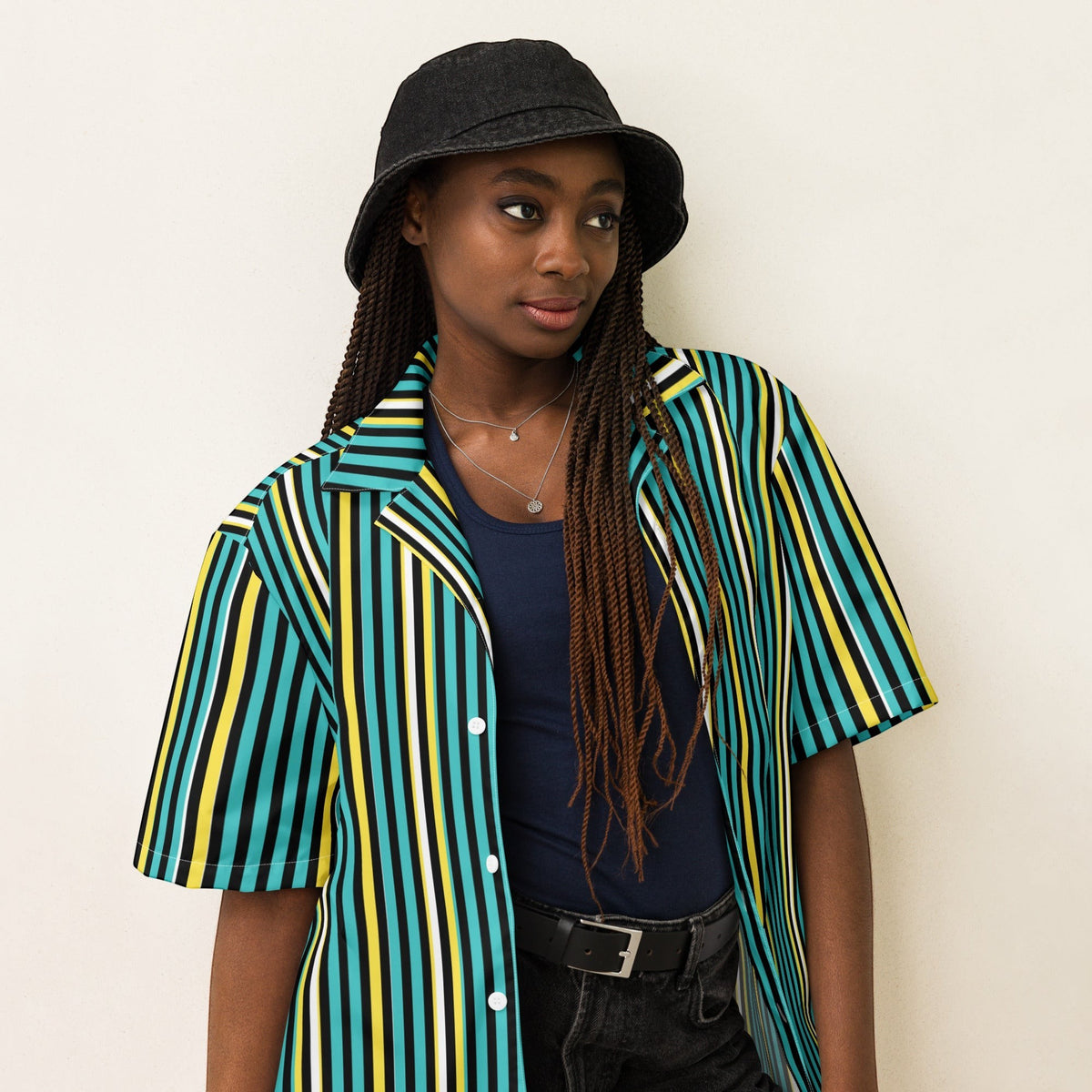 Good Wishes 365 teal striped short sleeve button-up shirt with UPF50+ protection worn by a model in a bucket hat.