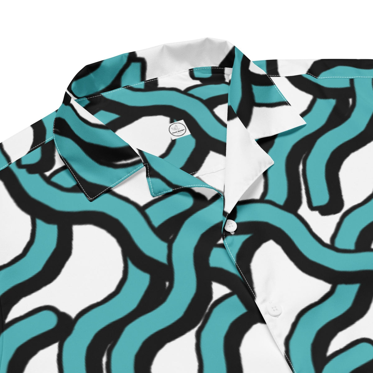 Good Wishes 365 women's button-down shirt with a teal and black abstract wave print and a crisp white camp collar.