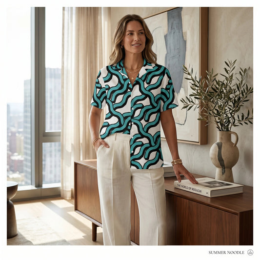 Good Wishes 365 women's teal and black abstract wave print button-down shirt with UPF50+ protection and a camp collar.