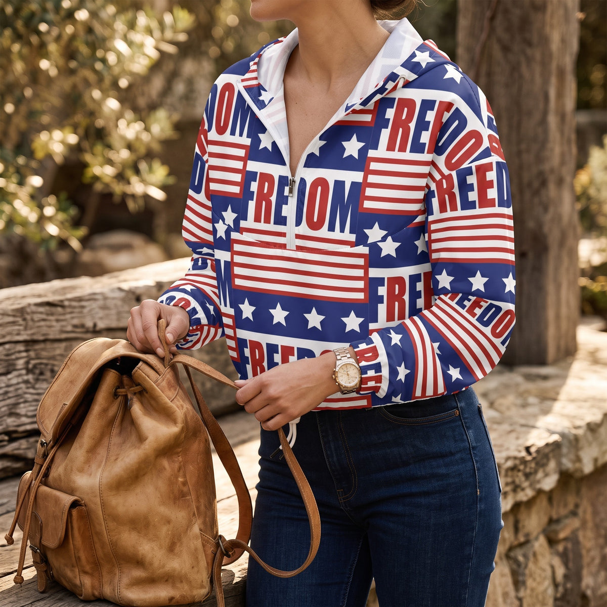 Good Wishes 365 women's cropped windbreaker with red, white, and blue USA flag and freedom print, half-zip with hood.