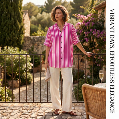 Good Wishes 365 unisex short sleeve button shirt with violet and red vertical stripes and a relaxed camp collar.