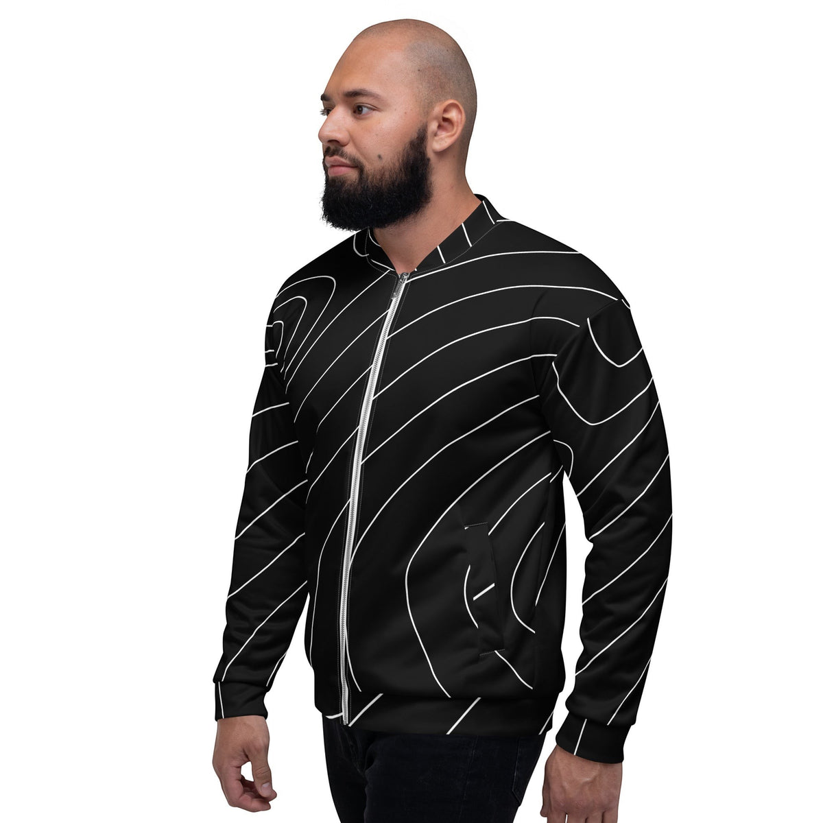 Good Wishes 365 unisex bomber jacket in black with a white modern wave line print, worn by a man in profile view.