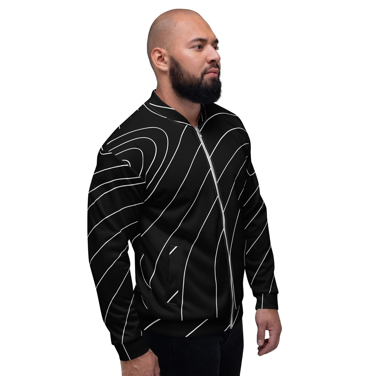 Good Wishes 365 unisex bomber jacket in black with a white modern wave line print worn by a bearded man