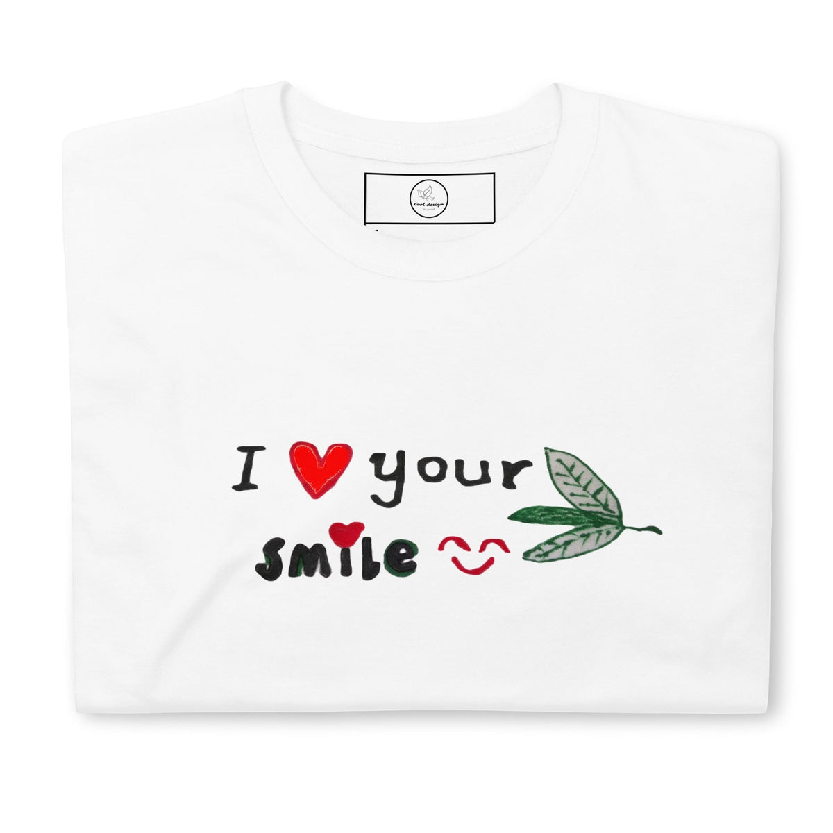Good Wishes 365 white unisex crewneck t-shirt with I Love Your Smile graphic, red hearts, and green leaf accents.