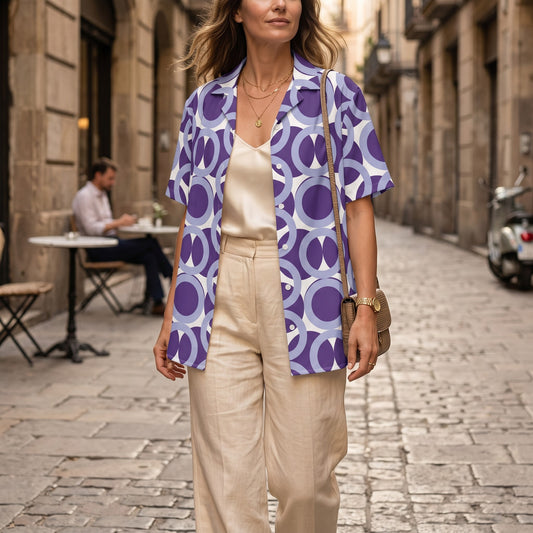 Good Wishes 365 unisex button shirt in purple with a retro geometric circle print, worn over a cream camisole.