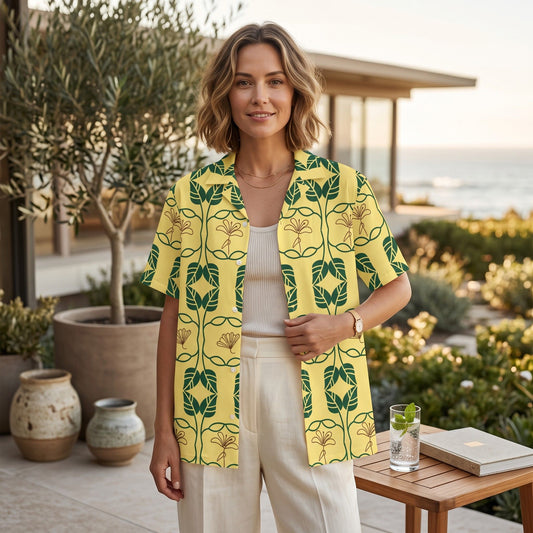 Good Wishes 365 yellow short sleeve button down shirt with green and gold botanical geo print worn by a woman outdoors