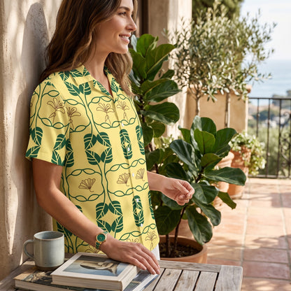 Good Wishes 365 yellow short sleeve button down shirt with green and gold botanical geometric print on a woman