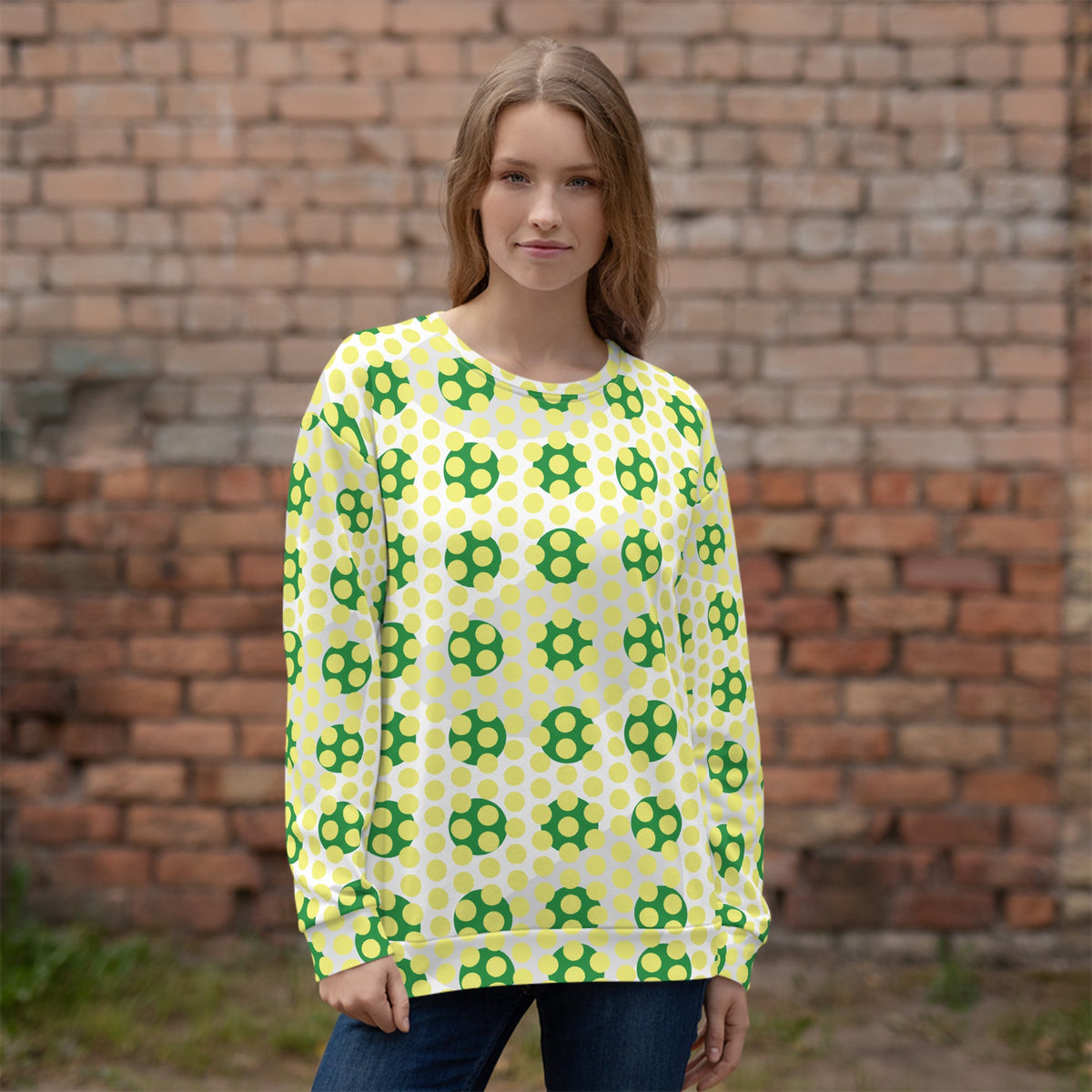 Good Wishes 365 recycled sweatshirt with a yellow and green 70s pop art geometric print worn by a woman