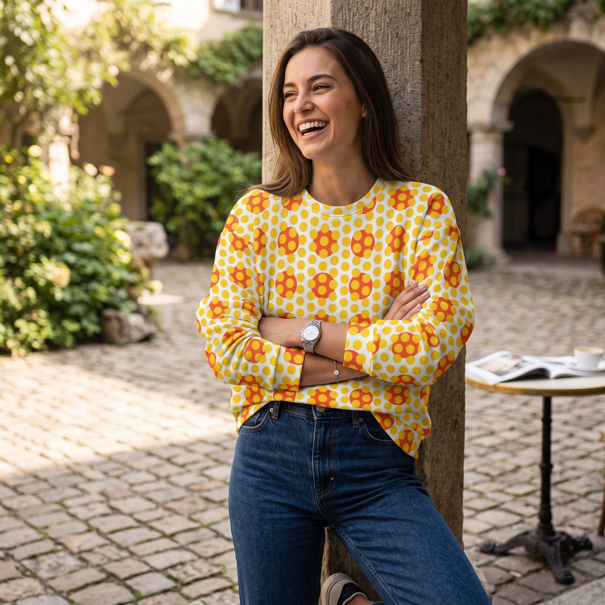Good Wishes 365 women's yellow and orange 70s pop art geometric print recycled crew neck sweatshirt worn by a model