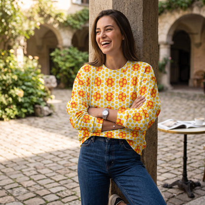 Good Wishes 365 women's yellow and orange 70s pop art geometric print recycled crew neck sweatshirt worn by a model