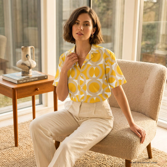 Good Wishes 365 yellow retro geometric print button-down shirt with camp collar worn by a woman in a sunlit room