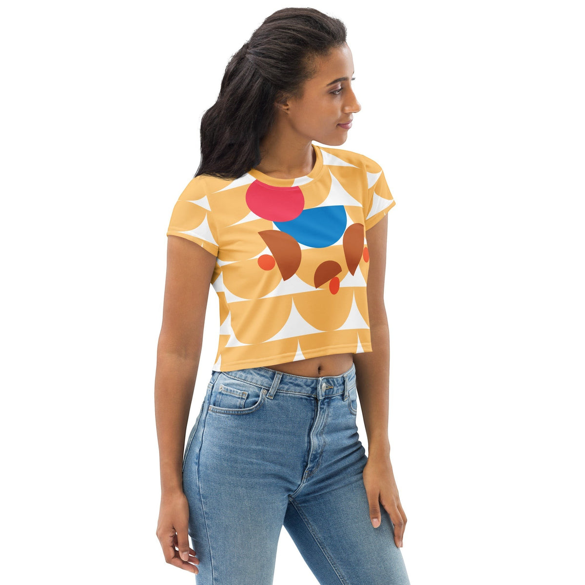 Good Wishes 365 yellow crop tee with geometric mushroom graphic print worn by a woman with blue jeans